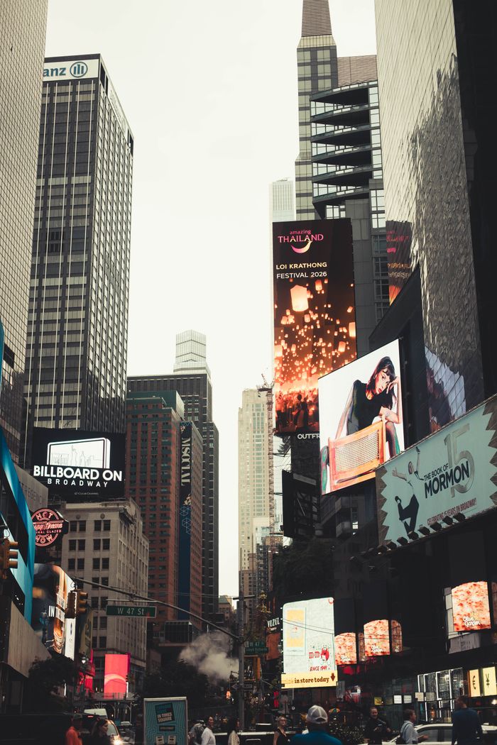 Portfolio A vibrant scene of Times Square with colorful billboards and skyscrapers in New York City.